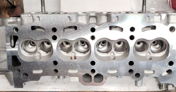 head_after_surface_and_valve_job_-_showing_thread_repair.jpg