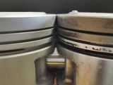 Toyota_high_comp_piston_compared_to_aftermarket_version.jpg